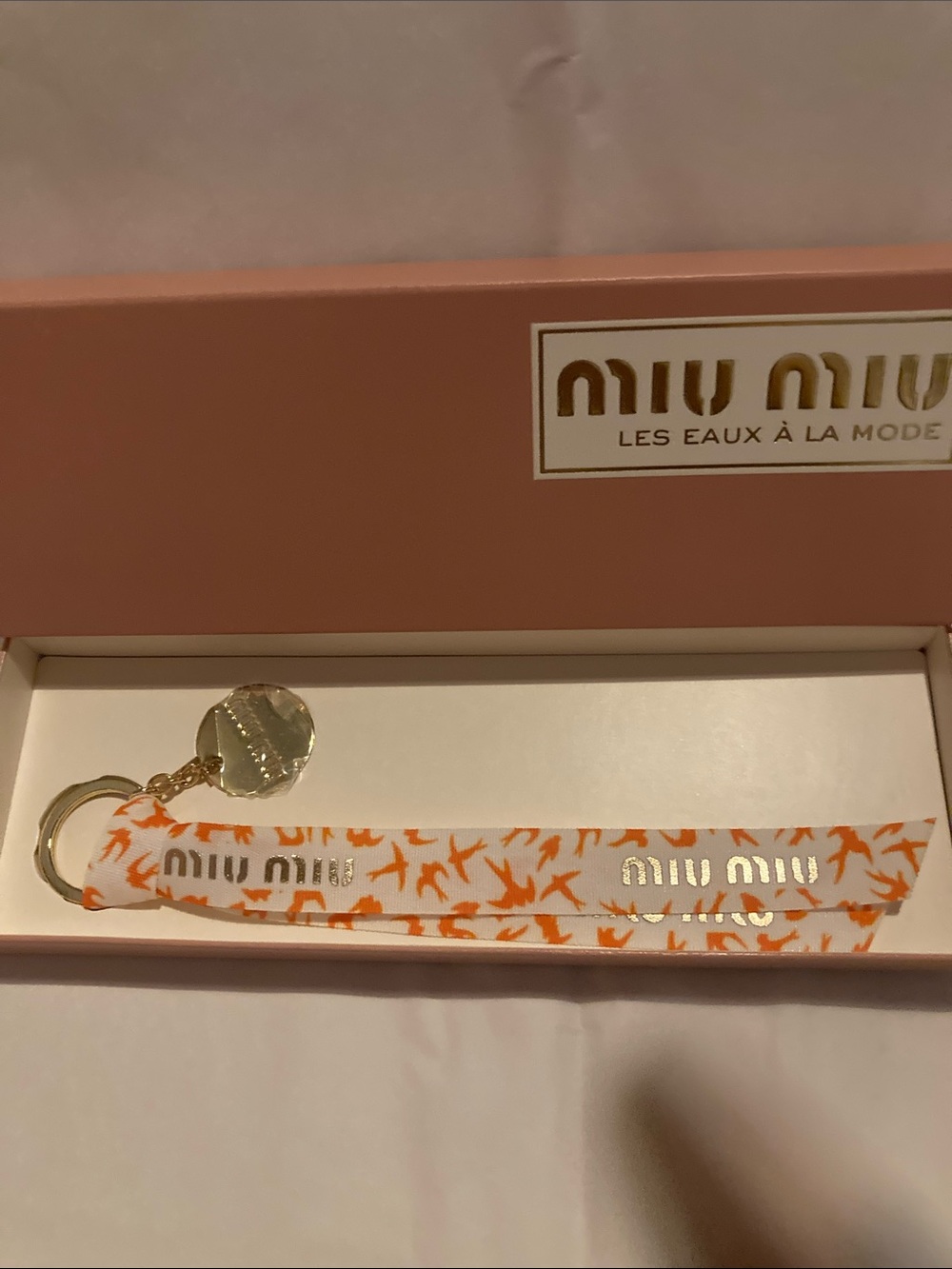 Miu Miu Orange & White Logo Strap Key Holder with Gold-Tone Disc